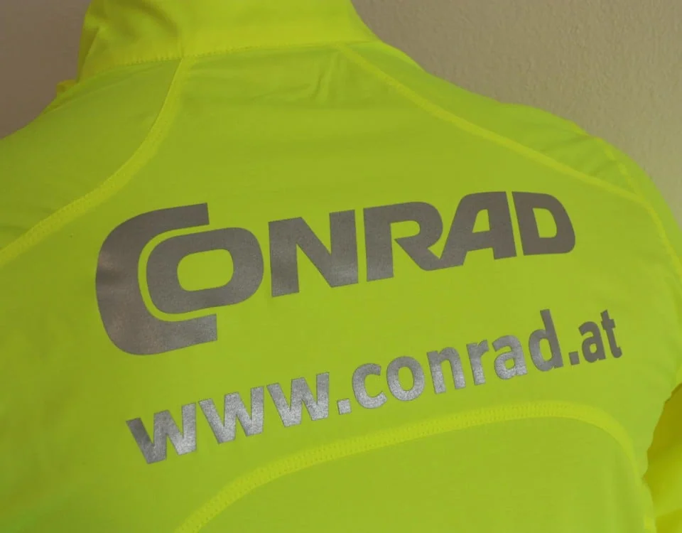 Neongelbe Laufjacke mit reflektierendem Aufdruck